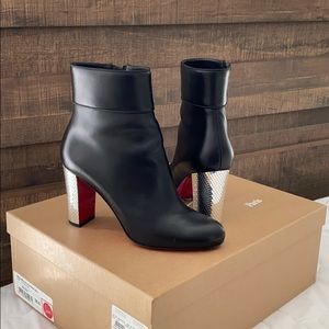 Christian Louboutin black disco ball booties.